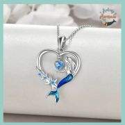 Mermaid sitting within heart necklace