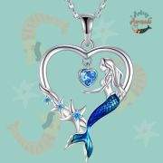 Mermaid sitting within heart necklace